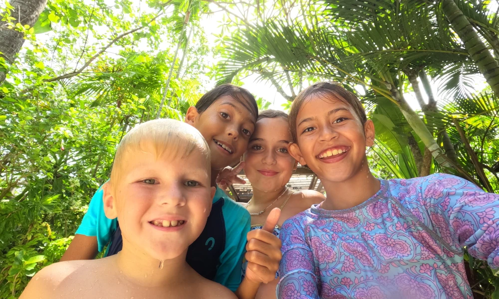 4 children in the jungle after swimming