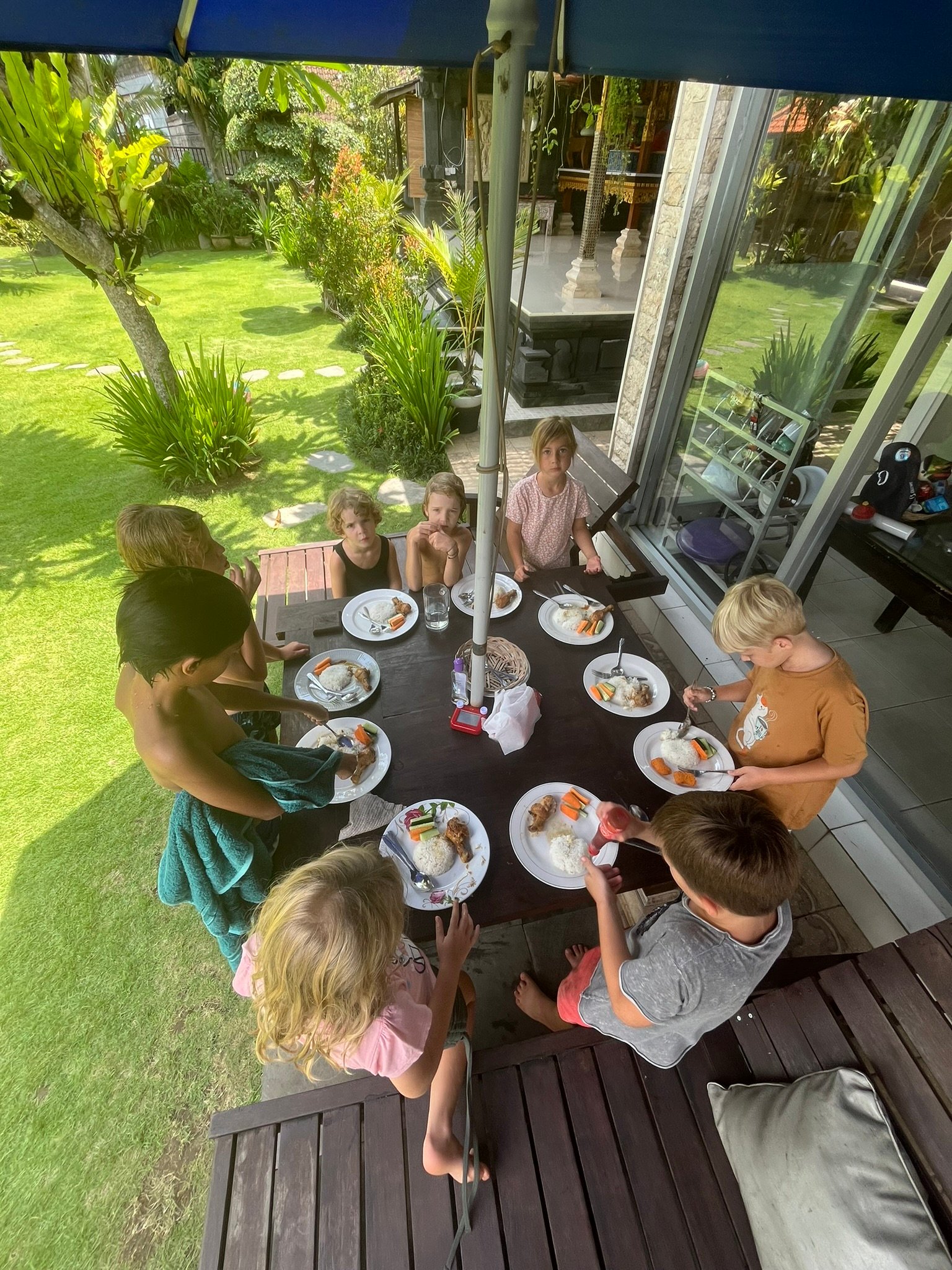 A group of children around a table making halloween pumpkins